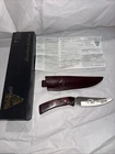 Buck 470 Mentor Knife Ducks Unlimited, Cut Out On Blade, Sheath New. Price: $89.99.