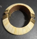 Vintage Chunky Bone Decorated Brass & Wood Bracelet Hinged Pull Pin Clasp Pre-owned. Price: $34.00.
